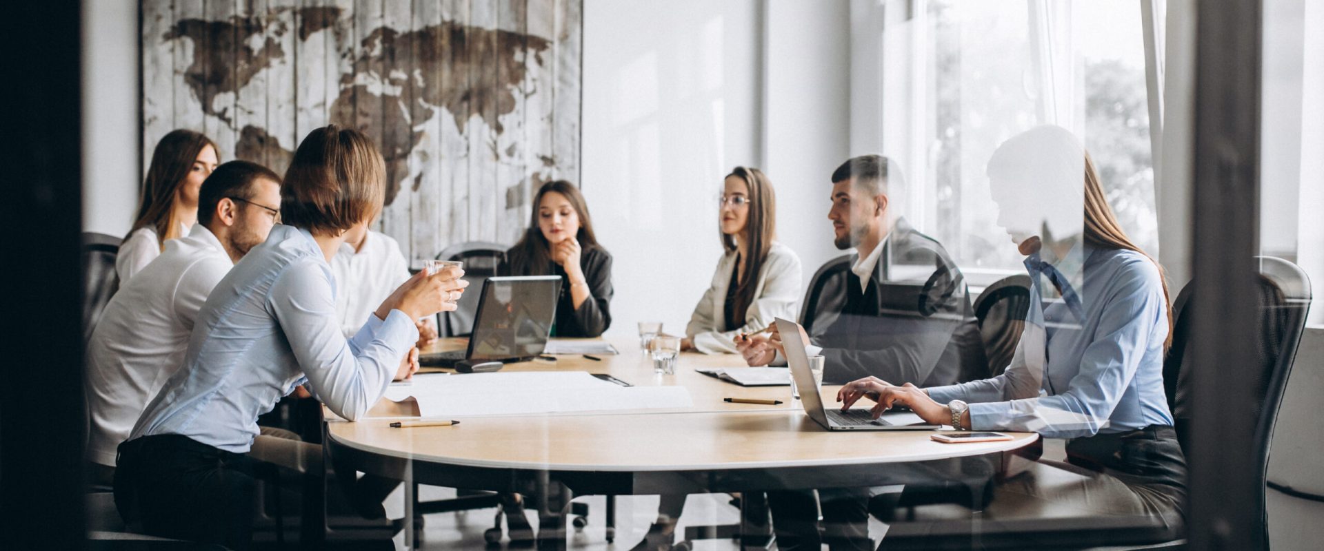 Group of people working out business plan in an office